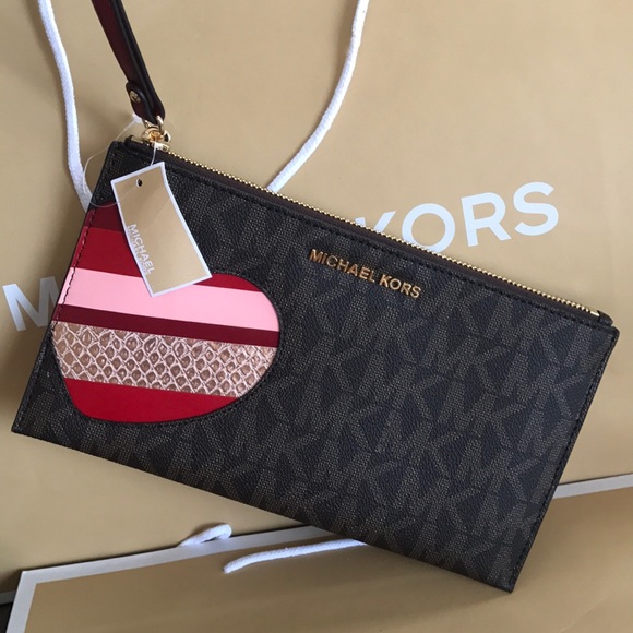 Michael Kors Handbags - FREE 💯🆕mk zip clutch🆕heart/brown cherry color